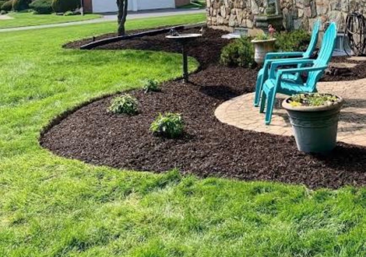 Freshly mulched beds with shrubs